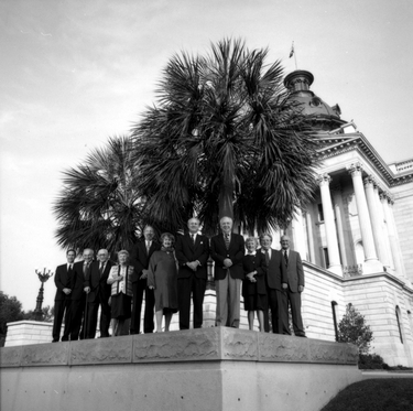 Photograph of present and past elected officials before the South Carolina State House