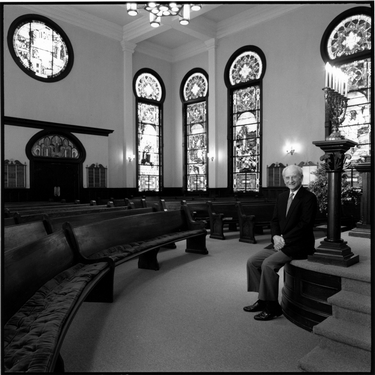 Photograph of Robert A. Moses inside Temple Sinai's sanctuary