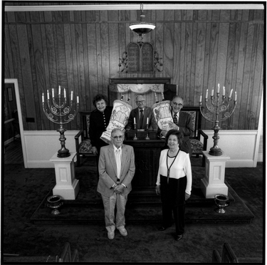Photograph of Deborah Baruch Abrams, Meyer Rosen, Alwyn Goldstein, Rita Levy Fogel, and Philip Schneider inside Temple Beth Elohim